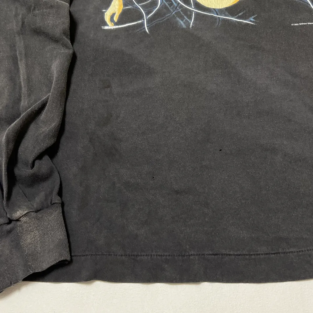 SAINT Mxxxxxx × GHOST IN THE SHELL Ghost in the Shell GS_LS TEE/GITS/BLK Big IP Ghost in the Shell co-branded model Sleeping Motoko Kusanagi Retro distressed long sleeves Washed black S-XL Ready-to-wear Assute dyeing Full-body spray fade/replacement fade Correct accessories Joint LOGO wash mark/main mark/cherub mark Super complex printing replica The drawing/pattern making cycle is very long and the hand graffiti is dirty.